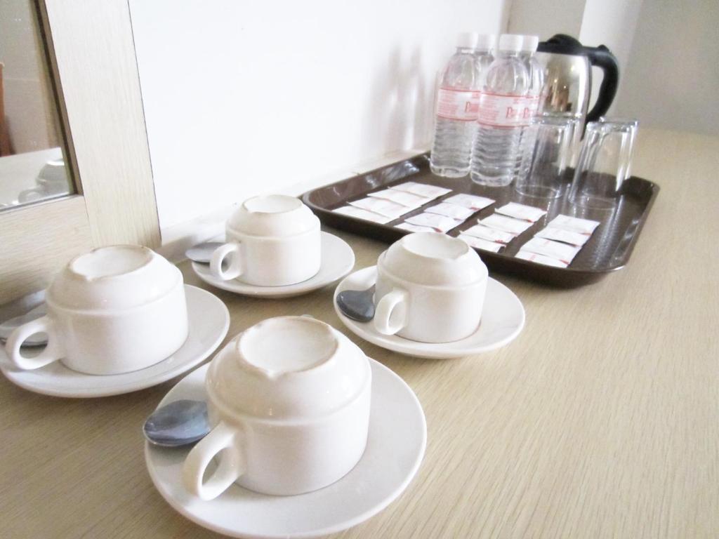 Promenade Service Apartment Кота-Кинабалу Номер фото